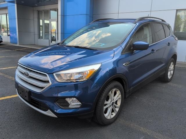 Used 2018 Ford Escape SE with VIN 1FMCU9GD0JUA28725 for sale in Newark, NY