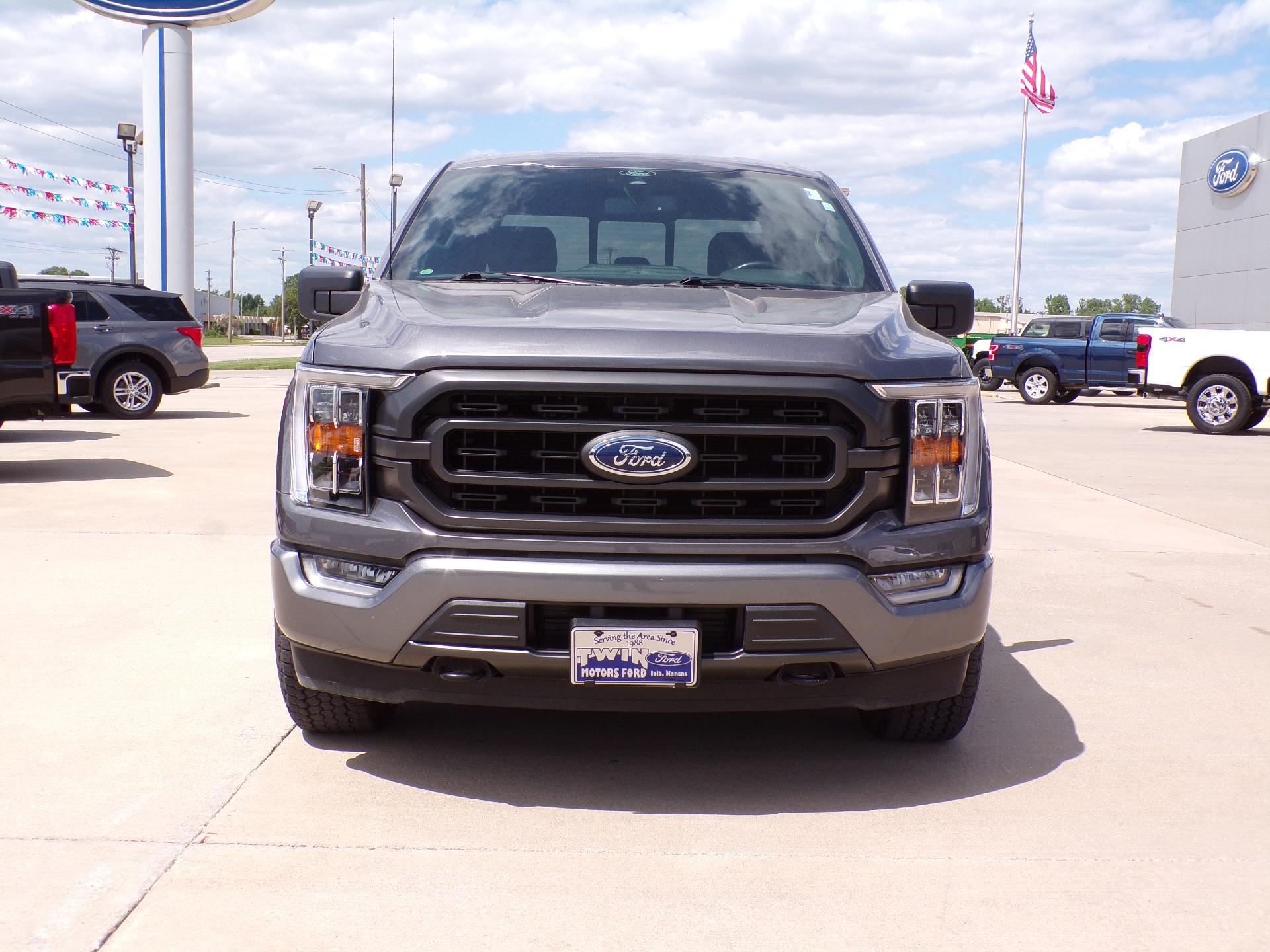 Used 2021 Ford F-150 XLT with VIN 1FTFW1E84MFA07467 for sale in Kansas City