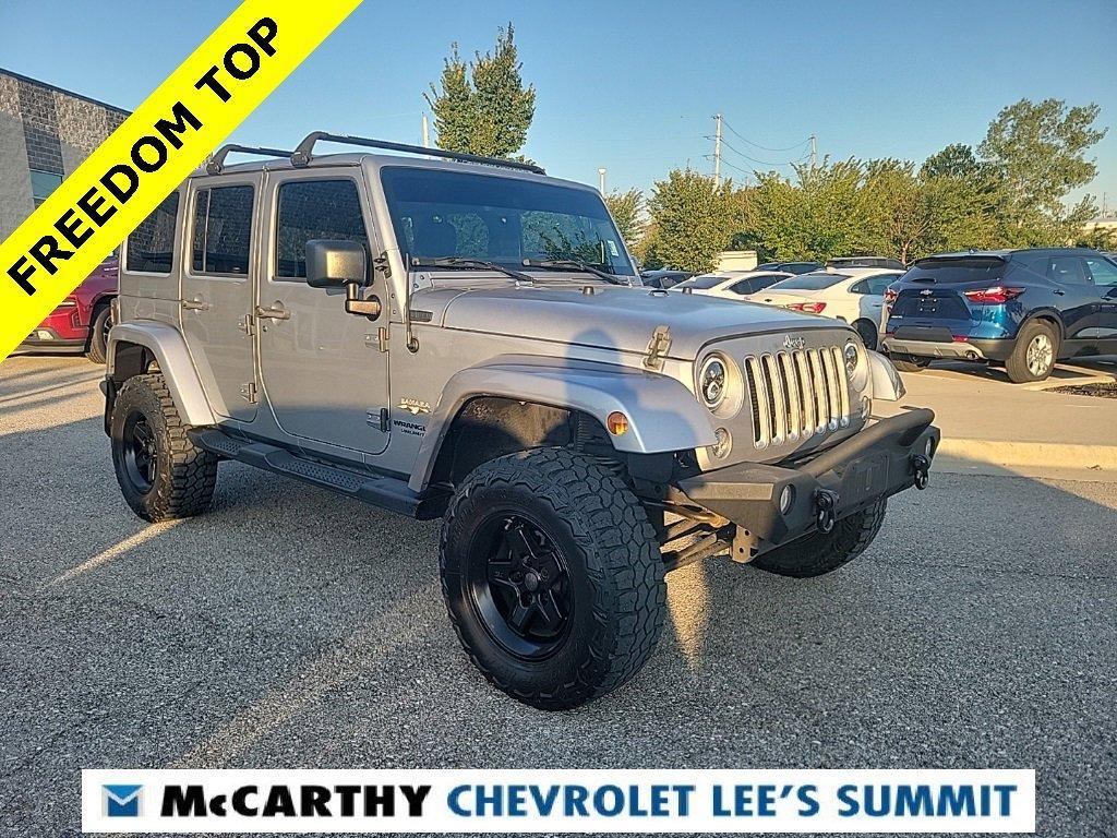 Used 2016 Jeep Wrangler Unlimited Sahara with VIN 1C4BJWEG9GL154780 for sale in Kansas City