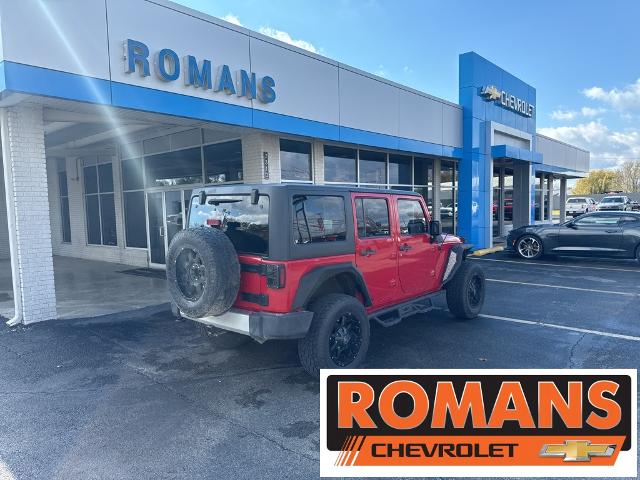 Used 2014 Jeep Wrangler Unlimited Sahara with VIN 1C4BJWEG1EL119664 for sale in Independence, KS