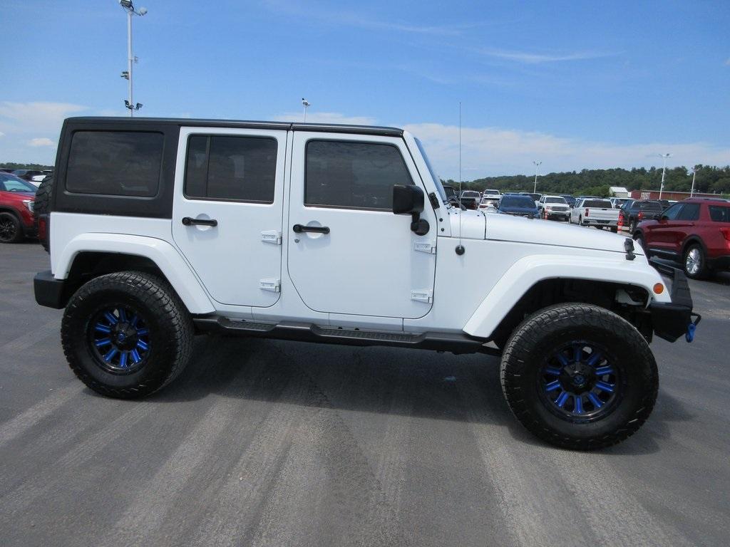 Used 2016 Jeep Wrangler Unlimited Sahara with VIN 1C4BJWEG0GL147927 for sale in Collinsville, IL