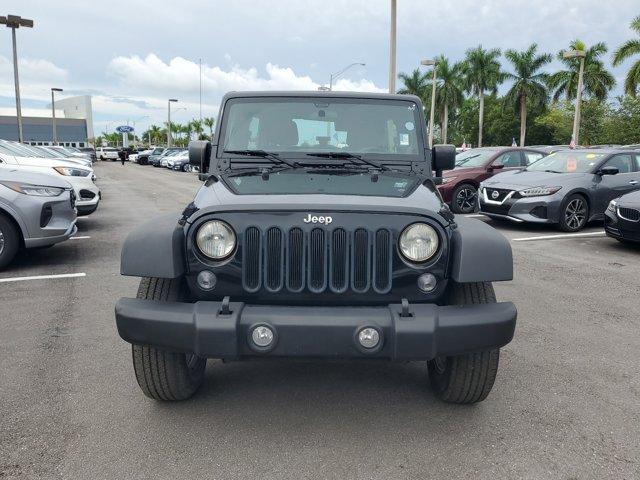 Used 2014 Jeep Wrangler Unlimited Sport with VIN 1C4BJWDG7EL290937 for sale in Homestead, FL