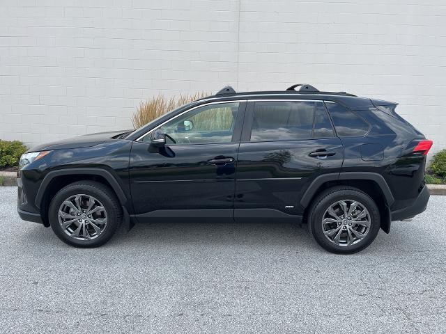 Used 2022 Toyota RAV4 XLE Premium with VIN JTMB6RFV4ND066260 for sale in Moline, IL