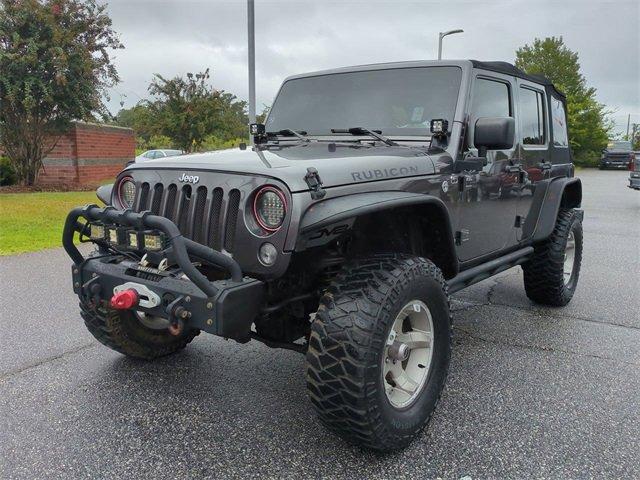 Used 2016 Jeep Wrangler Unlimited Rubicon with VIN 1C4BJWFG4GL211076 for sale in Tifton, GA