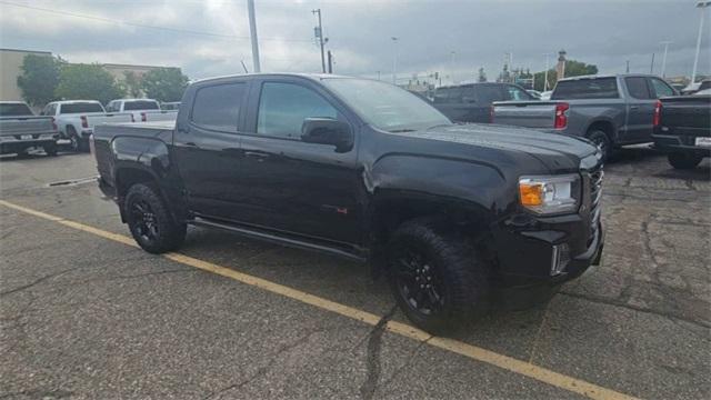 Used 2021 GMC Canyon AT4 with VIN 1GTG6FEN7M1272601 for sale in Saint Cloud, Minnesota