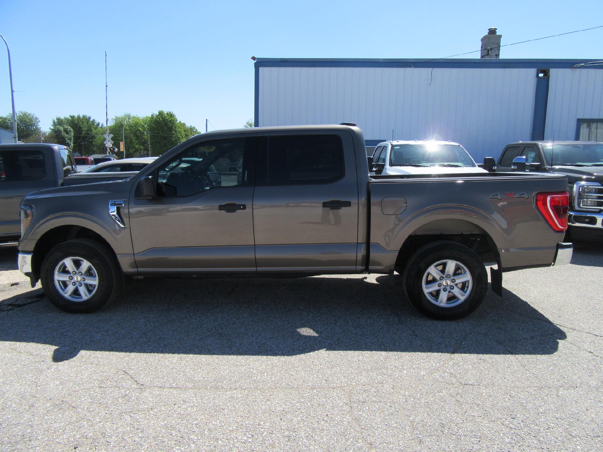 Used 2023 Ford F-150 XLT with VIN 1FTEW1EP6PFB81189 for sale in Emmetsburg, IA