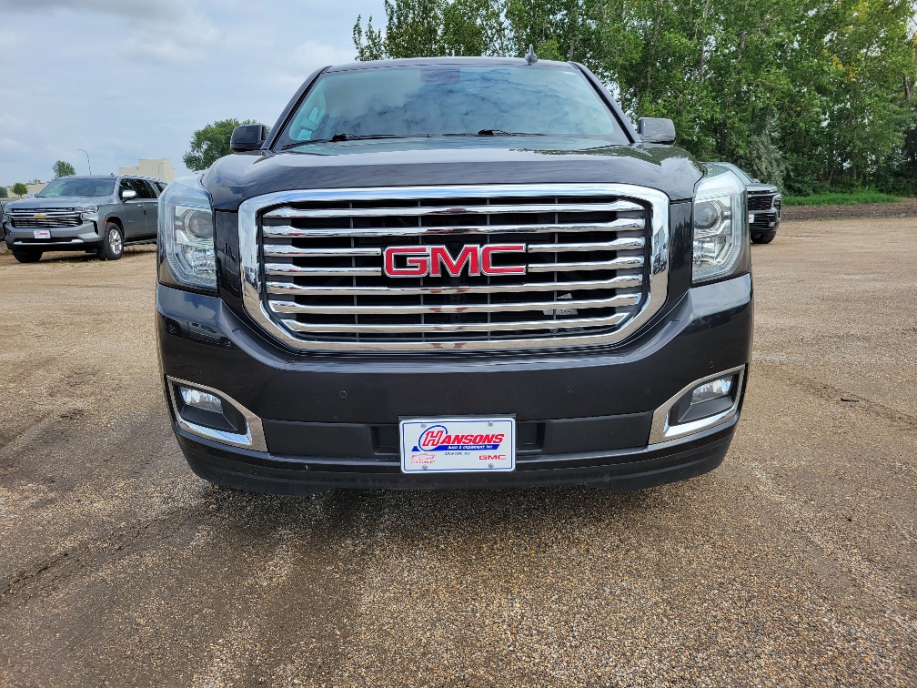 Used 2020 GMC Yukon SLT with VIN 1GKS2BKC9LR219663 for sale in Grafton, ND