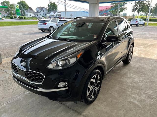 Used 2021 Kia Sportage EX with VIN KNDPNCAC6M7856779 for sale in Ossian, IN