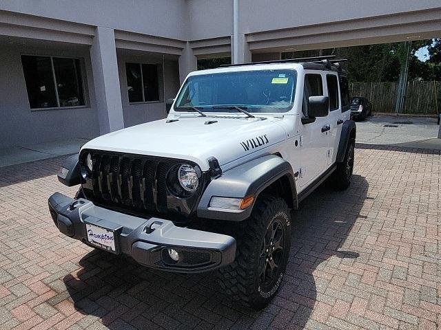 Used 2021 Jeep Wrangler Unlimited Willys Sport with VIN 1C4HJXDG9MW616010 for sale in Fort Walton Beach, FL