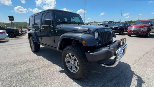 Used 2016 Jeep Wrangler Unlimited Rubicon with VIN 1C4BJWFG4GL337650 for sale in Birmingham, AL