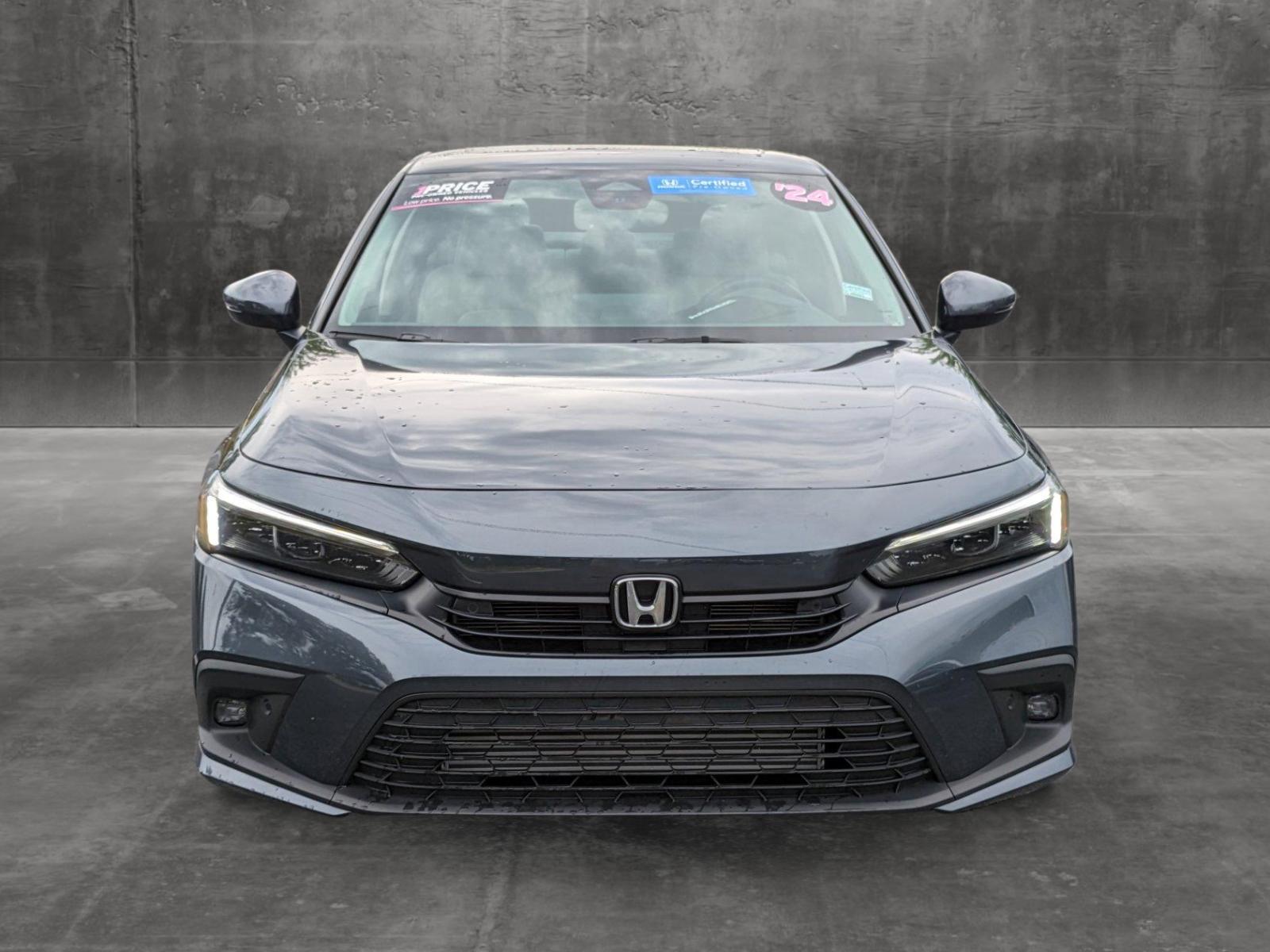 Used 2024 Honda Civic Touring with VIN 2HGFE1F9XRH302302 for sale in Orlando, FL