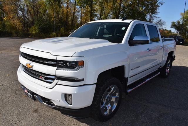 Used 2018 Chevrolet Silverado 1500 LTZ with VIN 3GCUKSEC8JG418524 for sale in Alexandria, Minnesota