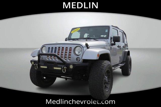 Used 2014 Jeep Wrangler Unlimited Sahara with VIN 1C4BJWEG8EL185340 for sale in Ayden, NC