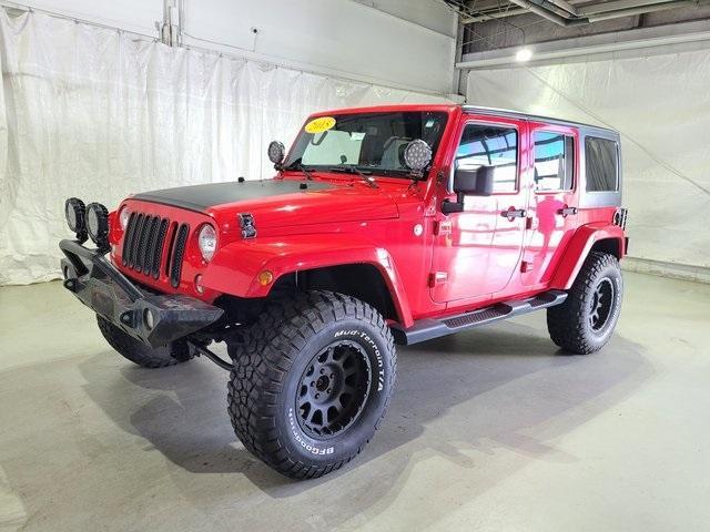 Used 2015 Jeep Wrangler Unlimited Sahara with VIN 1C4BJWEG2FL727436 for sale in Pinconning, MI