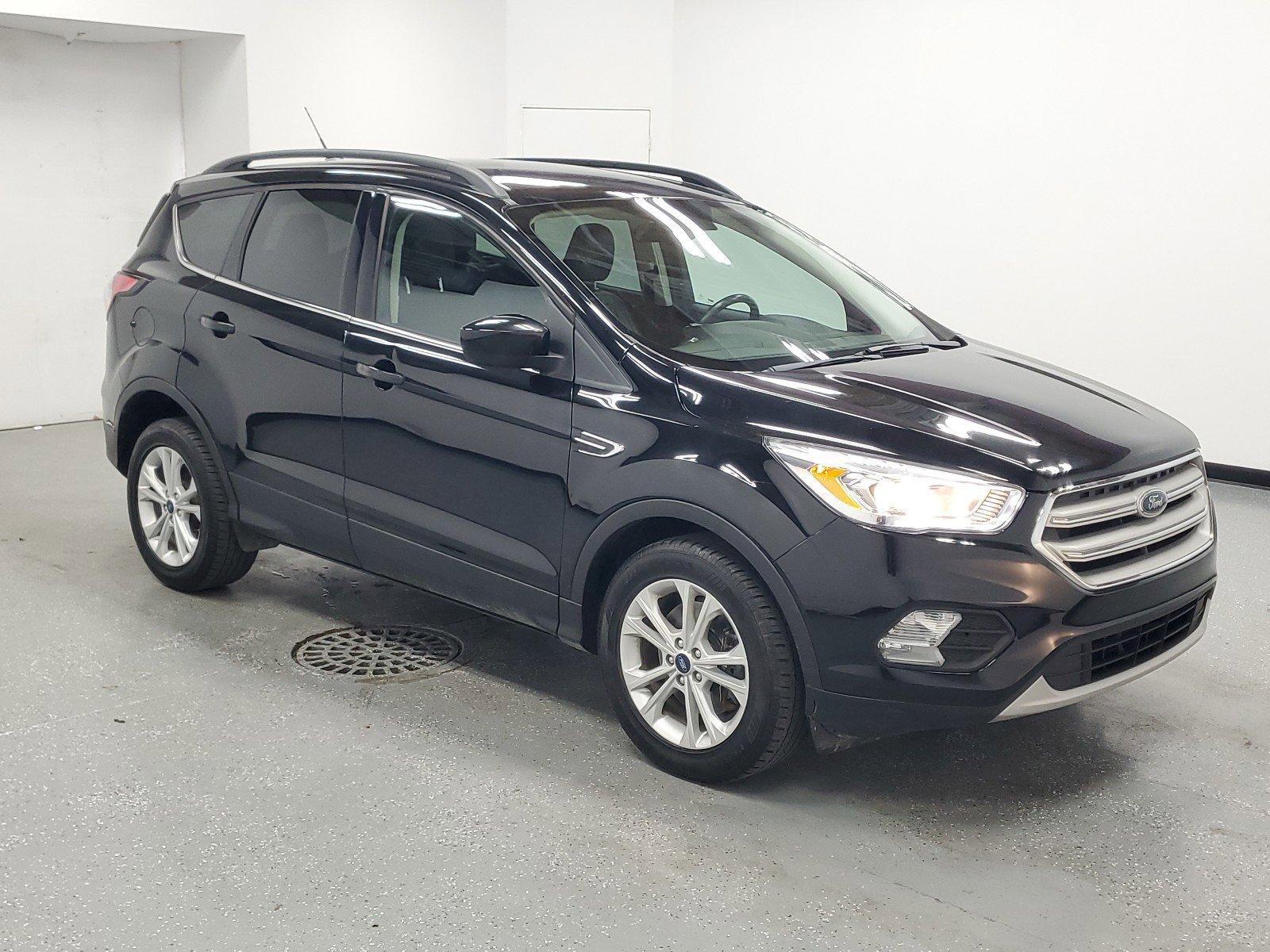 Used 2018 Ford Escape SEL with VIN 1FMCU9HD3JUC04701 for sale in Saginaw, MI