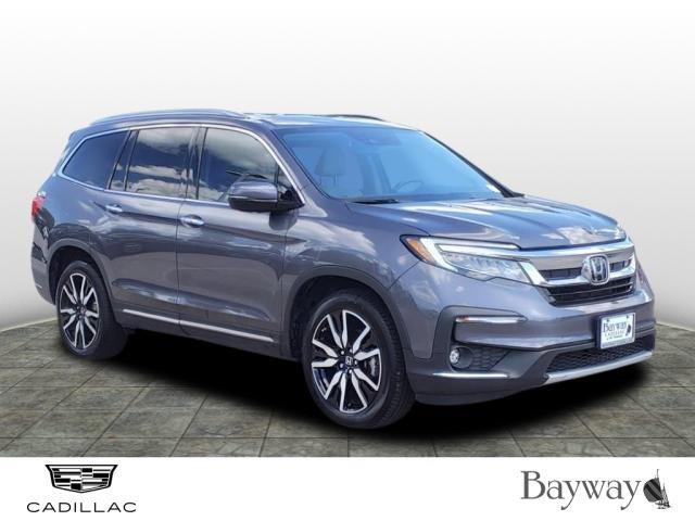 Used 2020 Honda Pilot Elite with VIN 5FNYF6H01LB067253 for sale in The Woodlands, TX