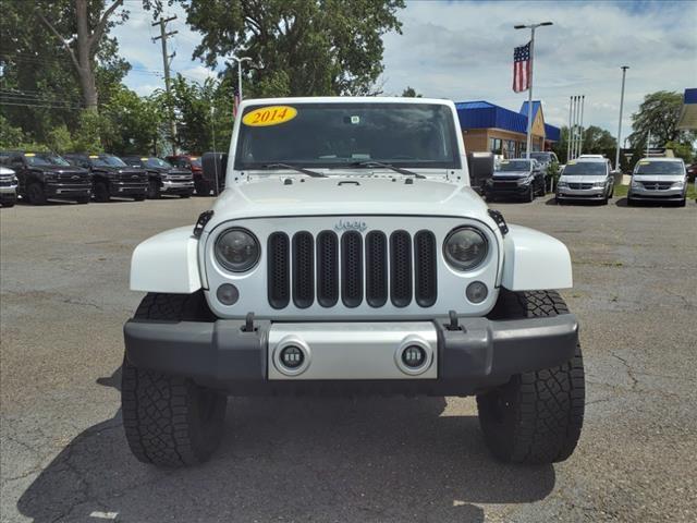 Used 2014 Jeep Wrangler Unlimited Sahara with VIN 1C4BJWEG7EL128921 for sale in Taylor, MI