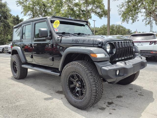 Used 2023 Jeep Wrangler 4-Door Sport with VIN 1C4HJXDGXPW619325 for sale in Cocoa, FL