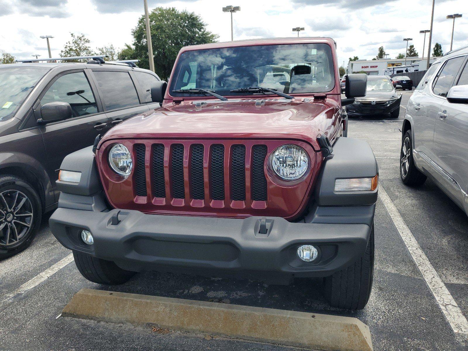 Used 2021 Jeep Wrangler Unlimited Sport with VIN 1C4HJXDGXMW622592 for sale in Clermont, FL