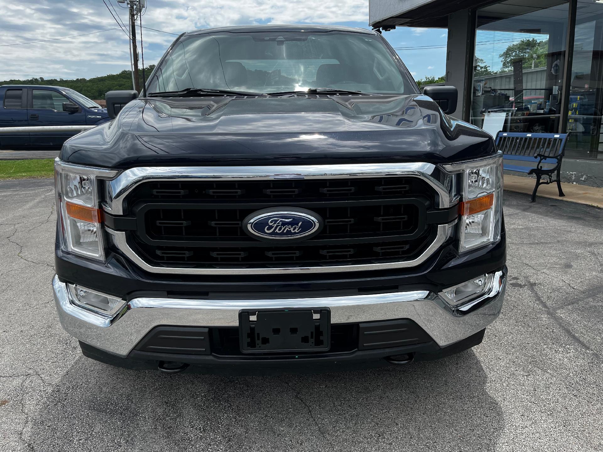 Used 2022 Ford F-150 XLT with VIN 1FTFW1E87NKD01857 for sale in Henryetta, OK