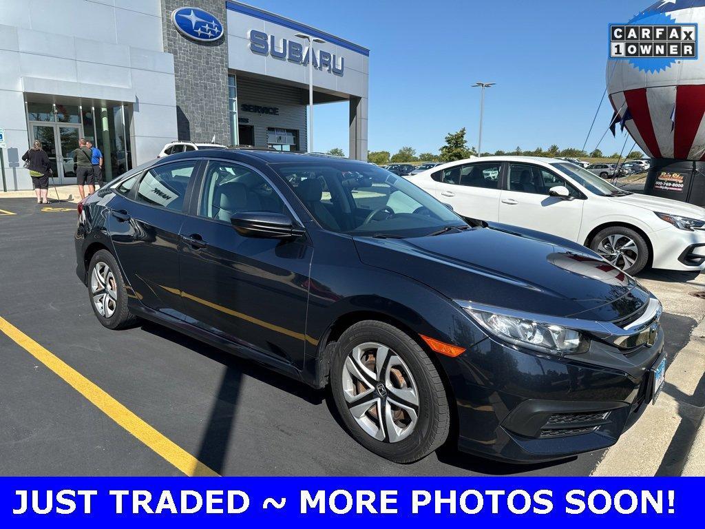 Used 2018 Honda Civic LX with VIN 19XFC2F56JE042116 for sale in Joliet, IL