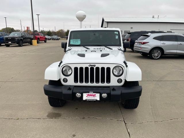 Used 2015 Jeep Wrangler Unlimited Sahara with VIN 1C4BJWEG2FL644623 for sale in Lennox, SD