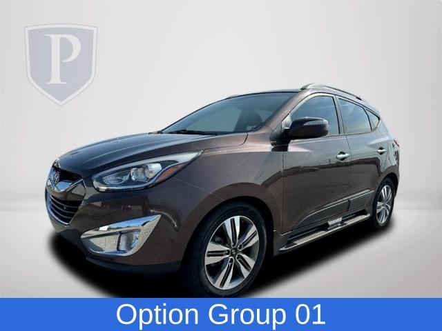 Used 2015 Hyundai Tucson Limited with VIN KM8JU3AG0FU975052 for sale in Greenville, SC