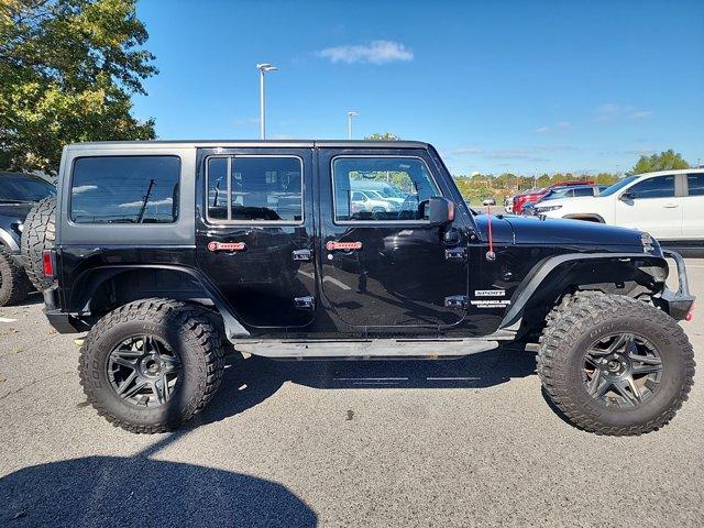 Used 2017 Jeep Wrangler Unlimited Sport with VIN 1C4BJWDG7HL608656 for sale in Southaven, MS