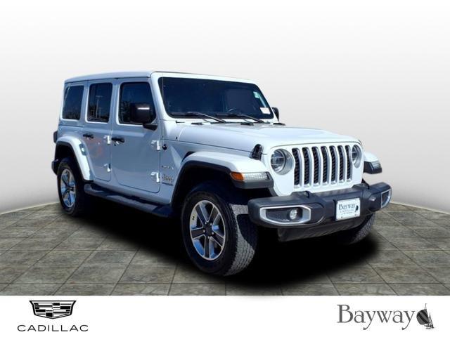 Used 2021 Jeep Wrangler Unlimited Sahara with VIN 1C4HJXEN9MW726116 for sale in The Woodlands, TX