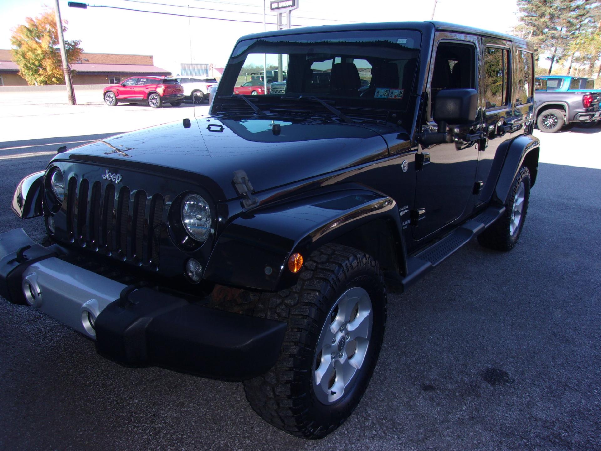 Used 2015 Jeep Wrangler Unlimited Sahara with VIN 1C4BJWEG5FL660556 for sale in Ebensburg, PA