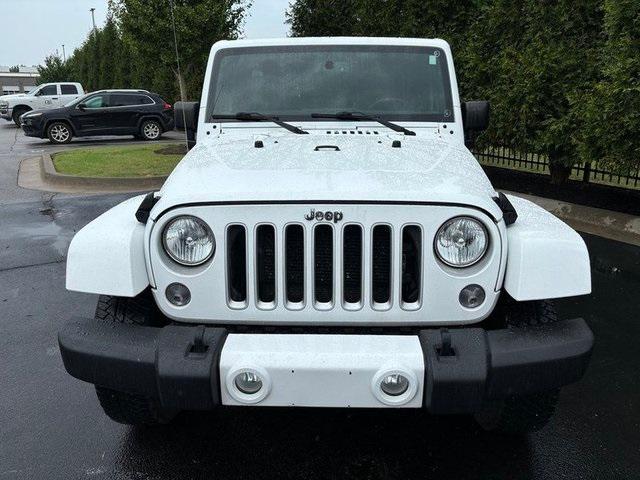 Used 2016 Jeep Wrangler Unlimited Sahara with VIN 1C4BJWEG4GL108094 for sale in Springdale, AR