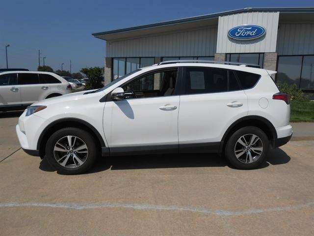 Used 2016 Toyota RAV4 XLE with VIN JTMRFREV3GD180933 for sale in Tyndall, SD