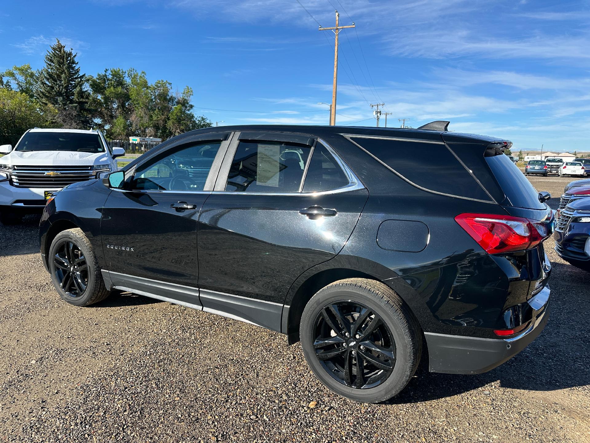 Used 2021 Chevrolet Equinox LT with VIN 3GNAXUEV0ML368951 for sale in Conrad, MT