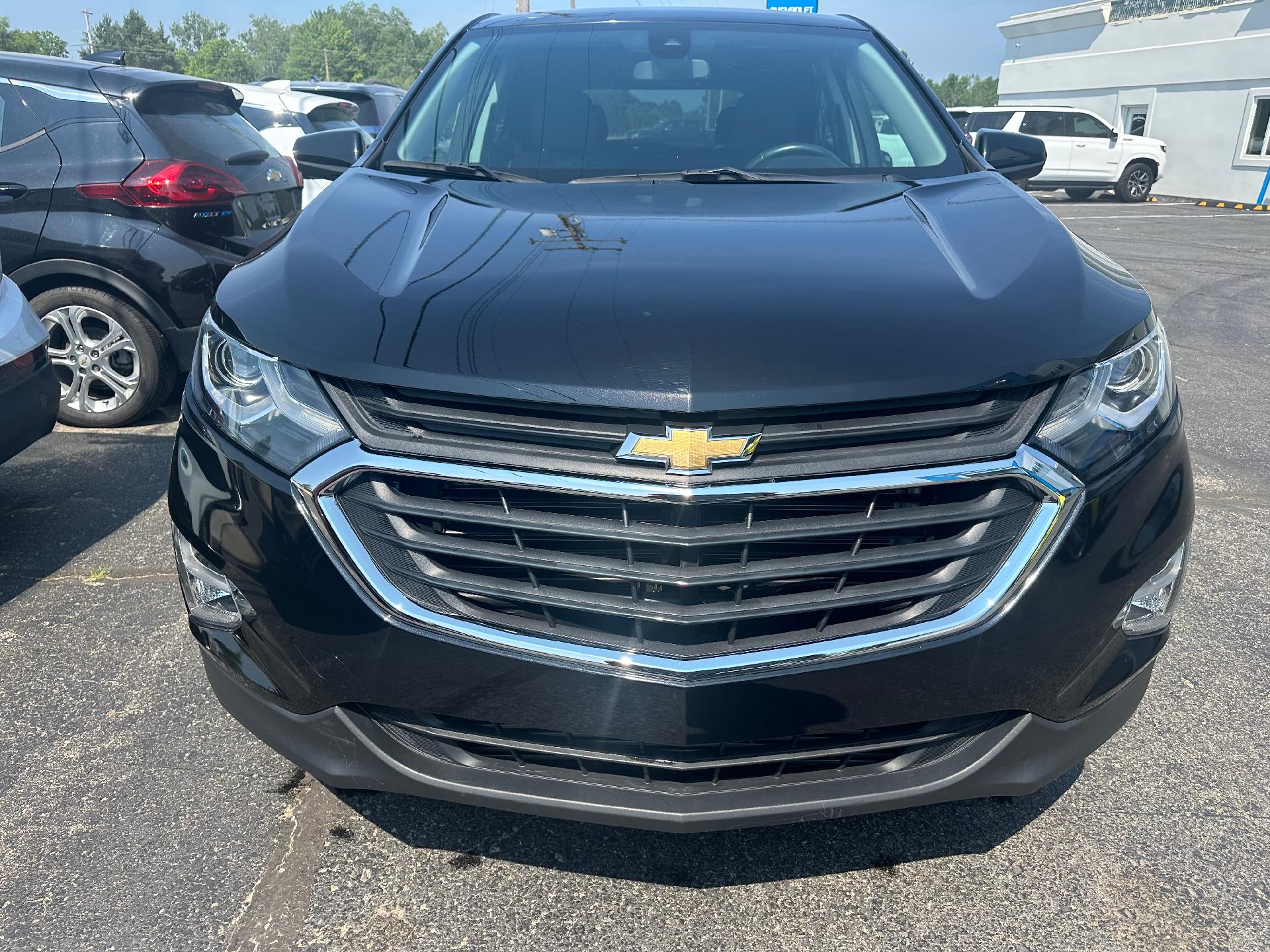 Used 2021 Chevrolet Equinox LT with VIN 3GNAXUEVXML353504 for sale in Clare, MI