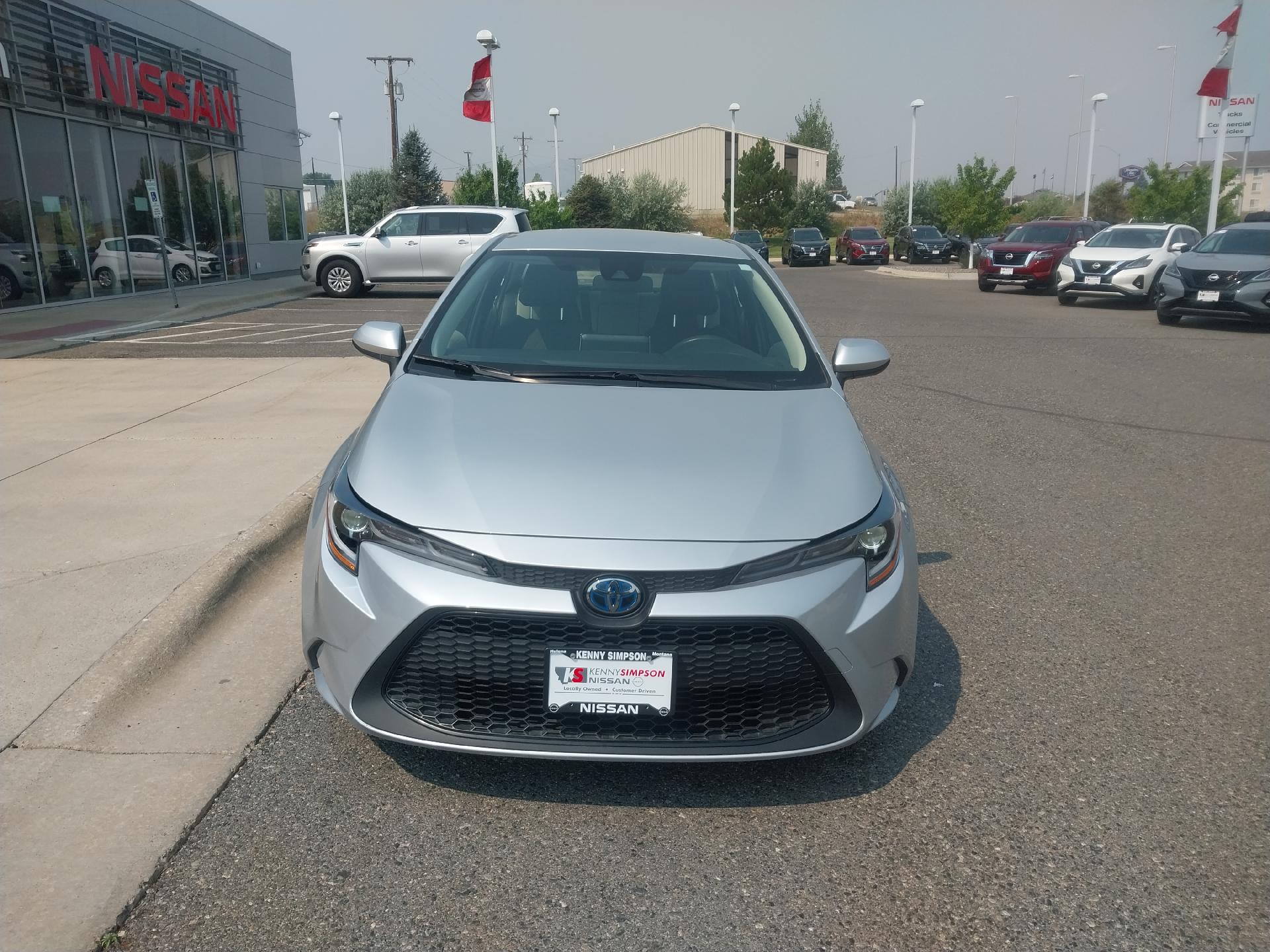 Used 2021 Toyota Corolla LE with VIN JTDEAMDE2MJ025577 for sale in Helena, MT