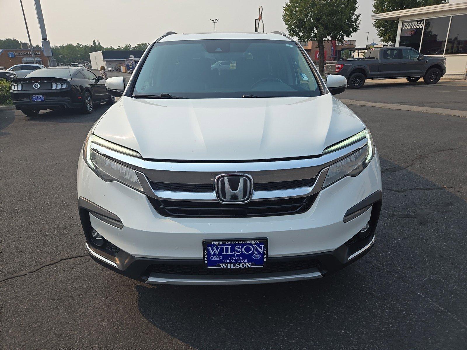 Used 2021 Honda Pilot Touring with VIN 5FNYF6H67MB045408 for sale in Logan, UT