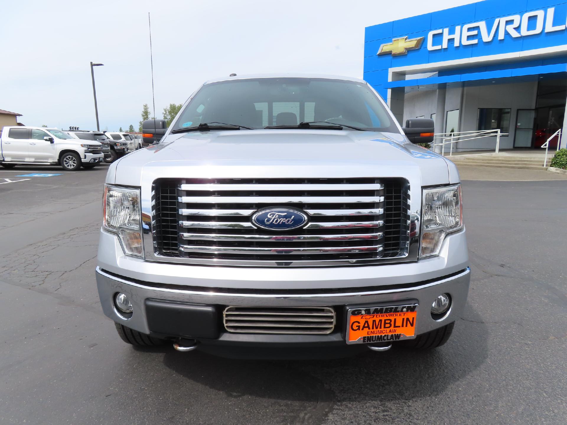 Used 2011 Ford F-150 XLT with VIN 1FTFX1ET4BFC24838 for sale in Enumclaw, WA