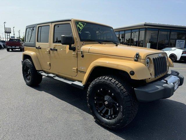 Used 2013 Jeep Wrangler Unlimited Sahara with VIN 1C4BJWEG1DL653472 for sale in Princeton, IL