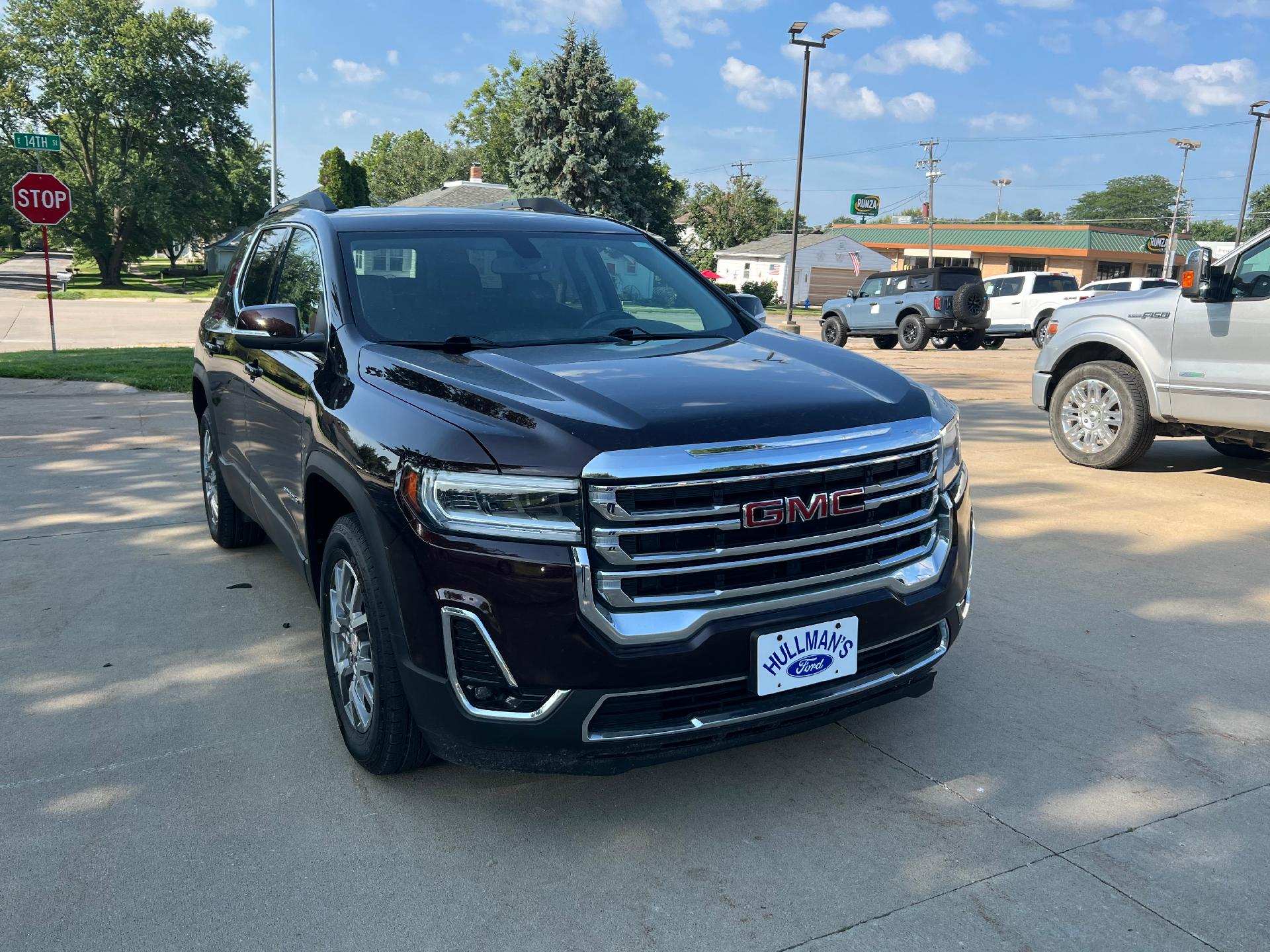 Used 2020 GMC Acadia SLT with VIN 1GKKNULSXLZ149017 for sale in Kansas City