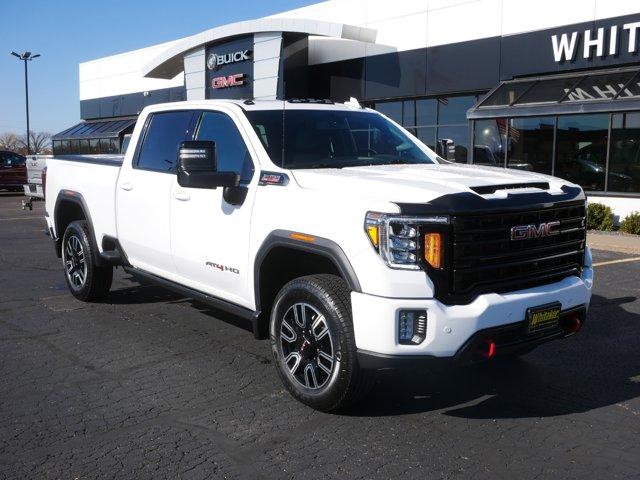 Used 2023 GMC Sierra 3500HD AT4 with VIN 1GT49VEY7PF144364 for sale in Forest Lake, MN