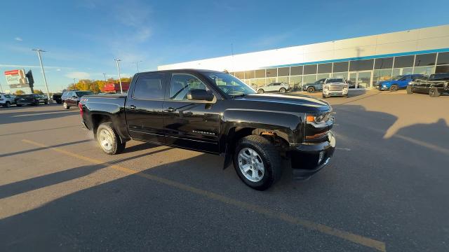 Used 2018 Chevrolet Silverado 1500 LT with VIN 3GCUKREC3JG581218 for sale in Saint Cloud, Minnesota