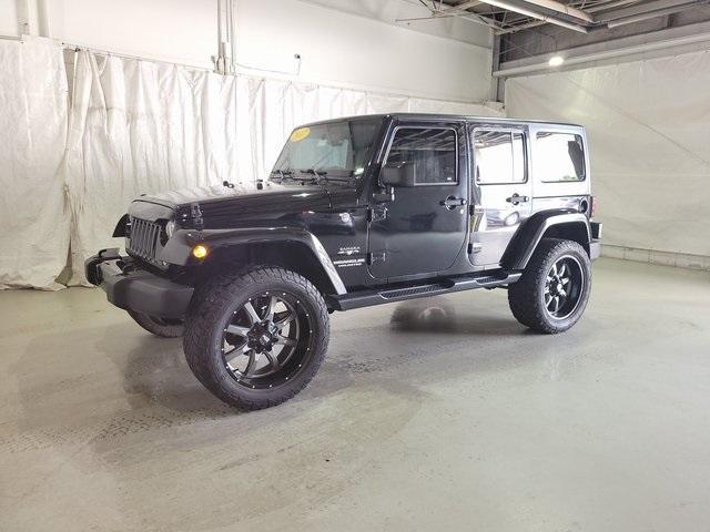 Used 2017 Jeep Wrangler Unlimited Sahara with VIN 1C4BJWEG8HL516003 for sale in Pinconning, MI