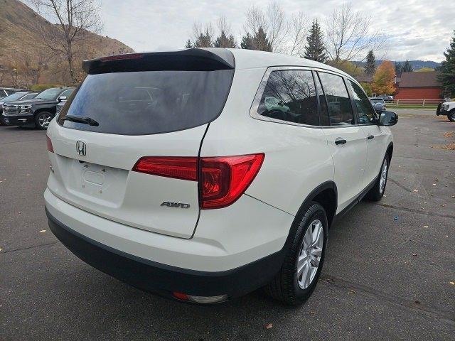 Used 2016 Honda Pilot LX with VIN 5FNYF6H12GB023051 for sale in Jackson, WY