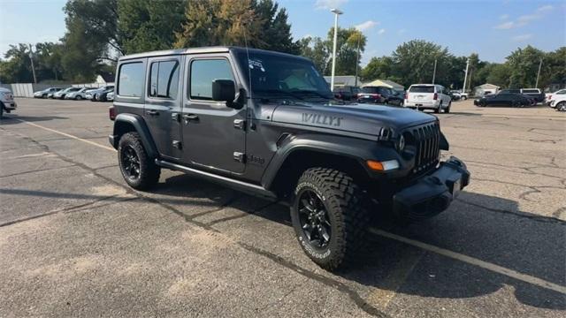 Used 2021 Jeep Wrangler Unlimited Willys with VIN 1C4HJXDG8MW740818 for sale in Saint Cloud, MN