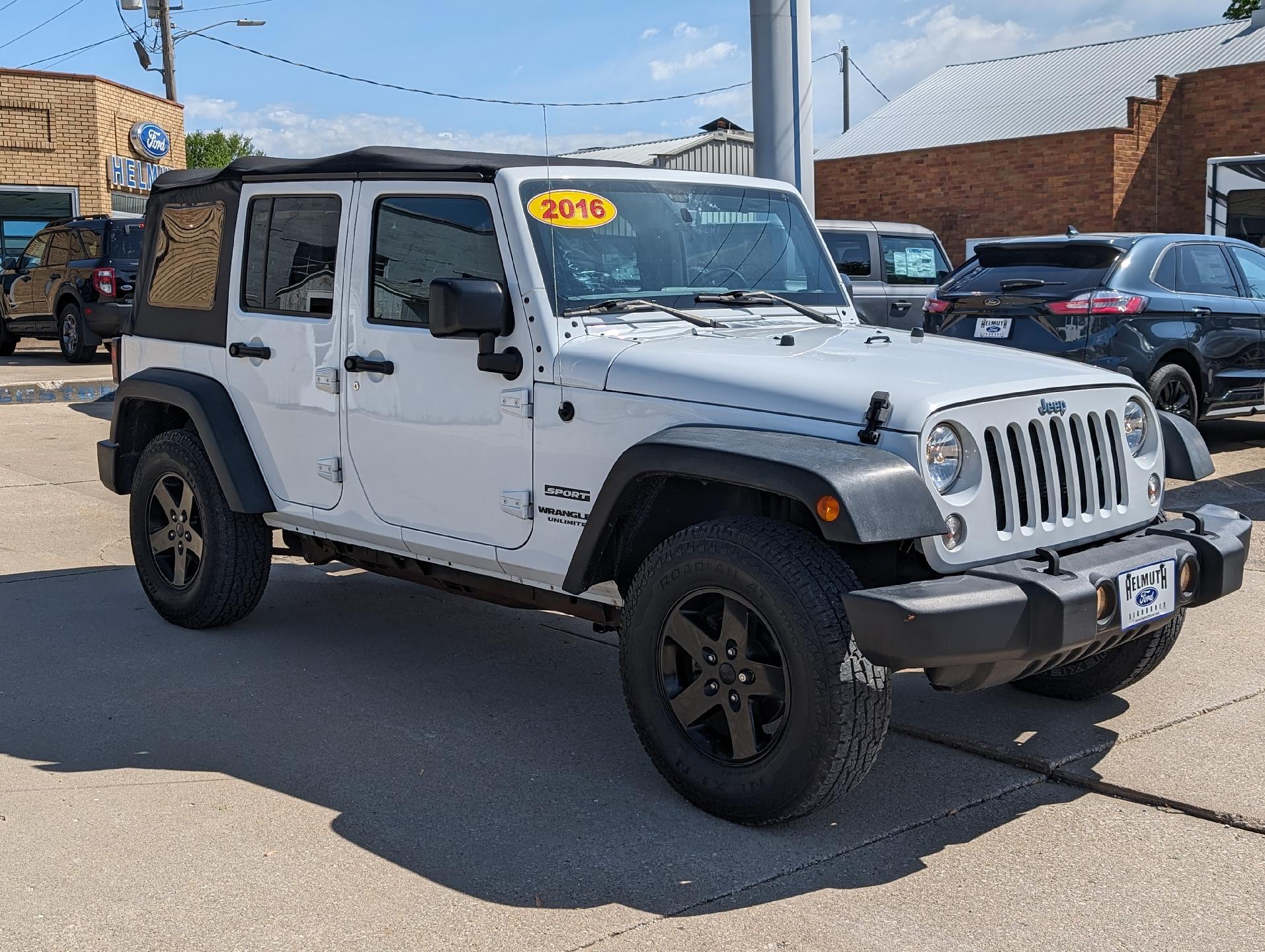 Used 2016 Jeep Wrangler Unlimited Sport S with VIN 1C4BJWDG9GL238860 for sale in Sigourney, IA