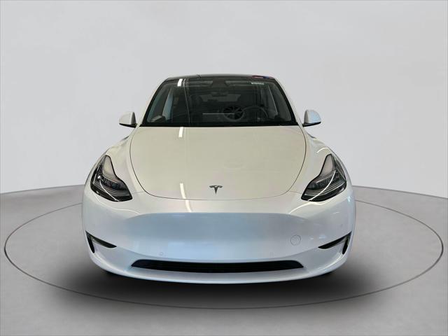 Used 2021 Tesla Model Y Long Range with VIN 5YJYGDEEXMF062801 for sale in Woodside, NY