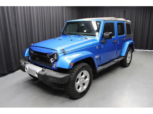 Used 2014 Jeep Wrangler Unlimited Sahara with VIN 1C4BJWEG0EL239780 for sale in Rittman, OH