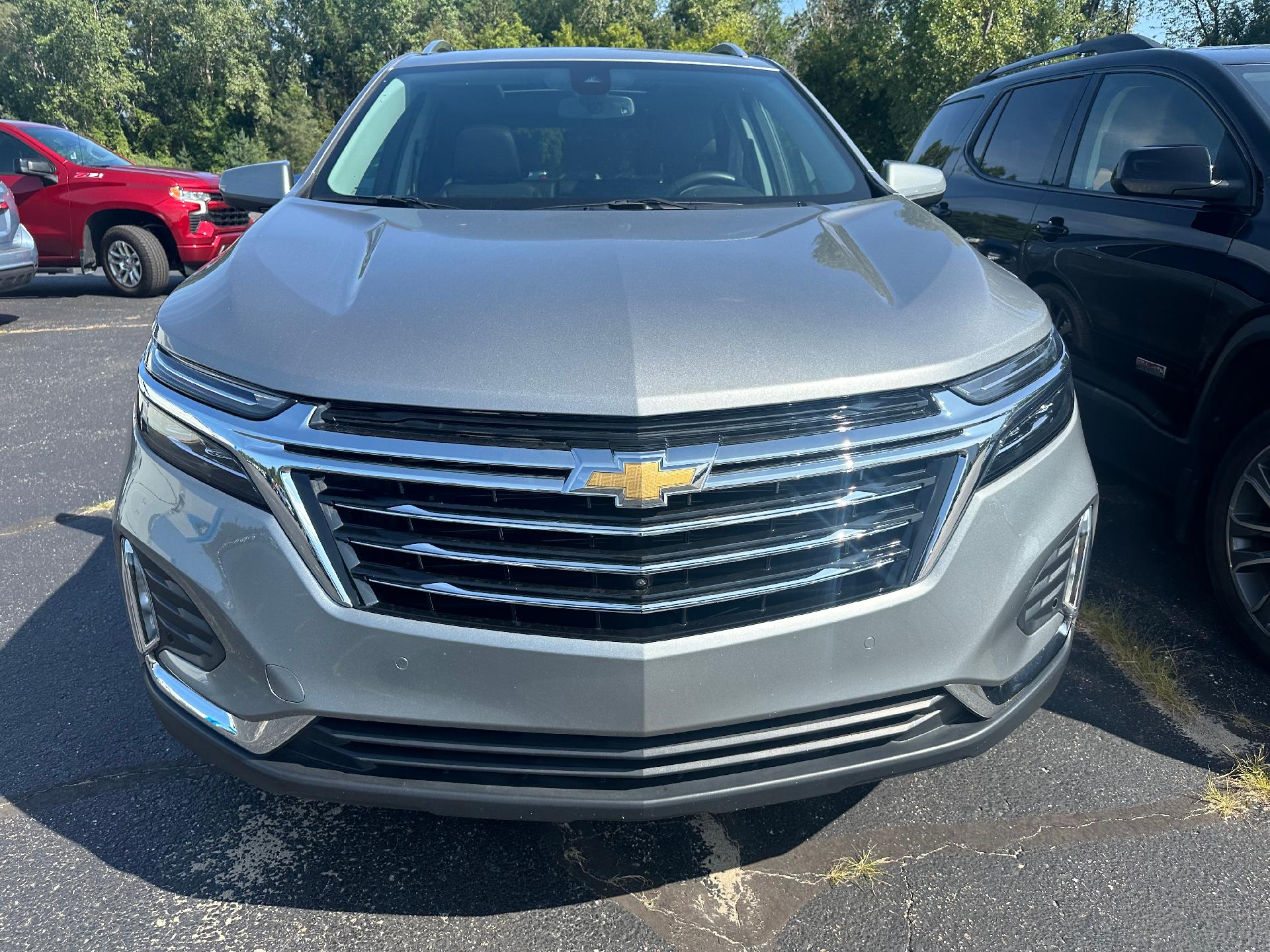 Used 2023 Chevrolet Equinox Premier with VIN 3GNAXXEG8PL212132 for sale in Clare, MI