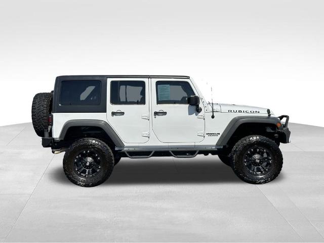 Used 2011 Jeep Wrangler Unlimited Rubicon with VIN 1J4BA6H19BL610223 for sale in Bullhead City, AZ