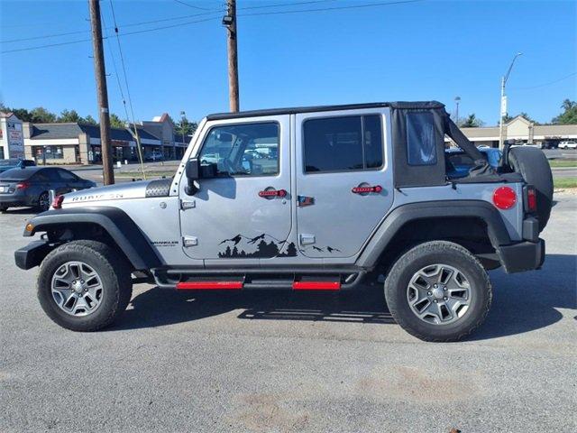 Used 2015 Jeep Wrangler Unlimited Rubicon with VIN 1C4BJWFG1FL591749 for sale in Fenton, MO